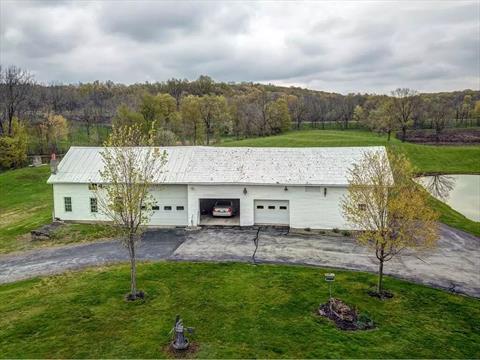 View from above. This 6. 4 level acre property is zoned AR. Endless possibilities!