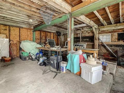 Walk up attic over part of the garage/barn.