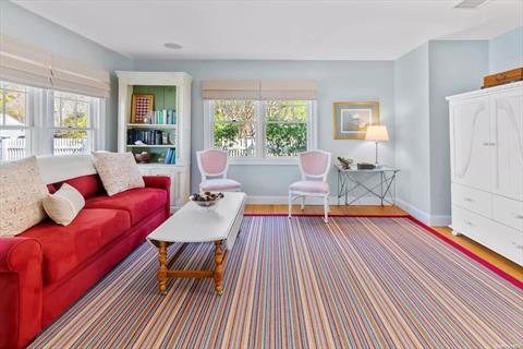 LIVING ROOM WITH WIDE-SCREEN TV