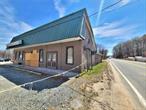 Opportunity knocks! Terrific corner location on the main route between Liberty and Loch Sheldrake and near Sullivan County Community College. High visibility on NYS Route 52. Needs some work but bones seem to be good. Recently operated as a pizzeria and car sales with a large 1BR apartment in the rear. Plenty of parking and access on two roads makes it good for many uses. There is a lot going on in the Sullivan County Catskills, take advantage of this great location. Minutes from the main shopping center in Liberty and downtown Hurleyville for cultural experiences and shops. The boiler is approximately 4-5 years old. Municipal water. Additional Information: HeatingFuel:Oil Above Ground,