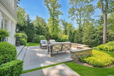 Private backyard - moon accent lighting in trees