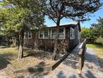 This Home is Available To Rent Weekly For $5, 950 NOT a month. Fire Island is a vacation destination. Simple and charming, this beach house is just what you need for a relaxing Summer get away. Located in the heart of Ocean Beach, it offers three bedrooms, full bath, kitchen, separate dining area and spacious living room. Outside, enjoy the sunshine on the sizable deck, BBQ after a day at the beach or simply relax in the hammock listening to the cool breeze.