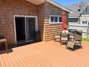 Renovated Beach House With Open Floor Plan And 3 Bedrooms. Huge Deck With Outside Shower! Open Concept With Sun Porch.