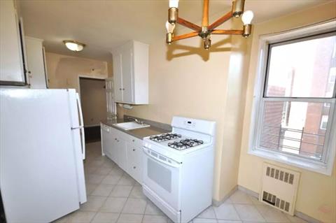 Eat-in Kitchen has plenty of cabinetry and counter space.