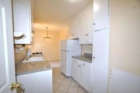 Eat-in Kitchen has plenty of cabinetry and counter space.