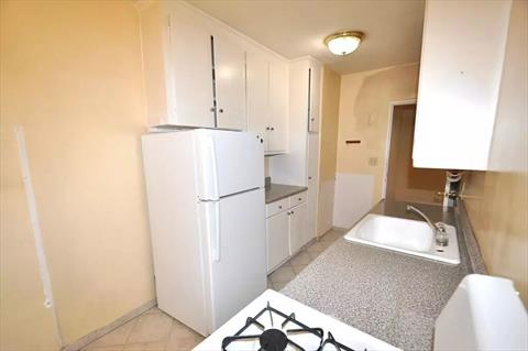 Eat-in Kitchen has plenty of cabinetry and counter space.