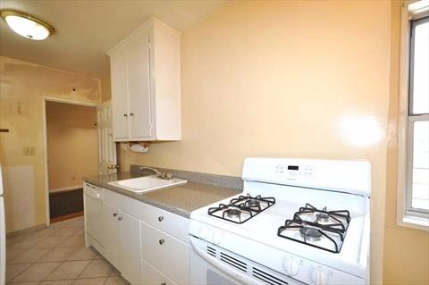 Eat-in Kitchen has plenty of cabinetry and counter space.