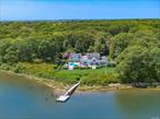 Boater&rsquo;s Paradise... Summer on Seatuck Cove Waterfront This charming, bay front home is ready for your summer retreat! Water views from living, dining and even the kitchen from this idyllic, waterfront setting on Seatuck Cove. Ample deck space, both on main level as well as from a 2nd story, Master en suite. Enjoy the luxurious in ground heated saltwater pool set against a dramatic deep water bay front. Bring your water toys and boat to enjoy nature in this impressive home with an inviting, detached button house.Community beach only a stone&rsquo;s throw away for the bird watching enthusiast. Come discover Seatuck Cove., Additional information: Appearance:great