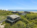 Welcome to One Atlantic Walk. This exceptional waterfront estate is located in the secluded Water Island community on Fire Island. The property transverses across a continuous .97-acre from the Great South Bay to the Atlantic Ocean and comprises 3 separate structures including The Ocean House, The Pool House, and The Bay House. From the moment you arrive at your private 250&rsquo; long dock in your 25&rsquo; Steiger Craft boat , which is included with the sale you are in true tranquil paradise. Your own private boardwalk leads you from the bay straight to the ocean. Totalling 4 Bdrms, 5 Full Bathrooms, Fitness Room and a Lap Pool, Atlantic Walk is the definition of a Secluded Beach Estate.