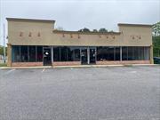Free Standing Building approx. 3000 Sq Ft @$40.00 sq.ft. corner property w/ entrances off of Montauk Highway and Grand Ave. High Traffic area shared parking lot with City MD, Wing Stop & Subway. Triple Net Lease Two Traffic Lights