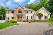 This classic colonial is enchanting at every turn, from its circular drive, picket-fencing, past its pristine five-bedroom, four and a half bath estate, on into a living- storybook backyard with secret gardens, secluded gazebos, cottage-like storage shed, specimen trees, apiary and ivy-lined paths winding across wooded hillsides to a stone-lined running brook and bridge, this amazing four-acre estate is a dream come true. A generous rear deck overlooks seemingly endless fenced lawns (with ample room for a pool and more). Ideal for year-round entertaining on a grand scale, the home&rsquo;s 4, 769-square-foot interior offers hardwood floors (where seen), high ceilings, second story entry, spacious sun-drenched rooms with a well-designed chef&rsquo;s kitchen, banquet-sized dining room, two-story foyer, elegant living room, adjoining den with fireplace, plus a full, finished basement with recreation room, gym/workshop, and large study with fireplace, clear white pine custom built-ins, all create an ideal opportunity for you to entertain on a grand scale year-round. A service wing with guest room, gym, laundry, and pantry accesses a finished three-car garage enhanced by custom storage, loft, ceramic-tile floor, air compressor, doggie door, and door-openers. The palatial main bedroom suite and bath with tray ceiling shares the second floor with three bedrooms-one ensuite, two baths, and an immense study/playroom. Come experience this magical property and fall in love. View 3D tour and floor plan.