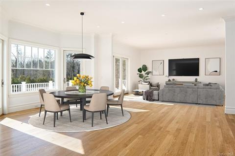 Oversized dining room with fireplace and butler’s pantry (Virtually Staged)