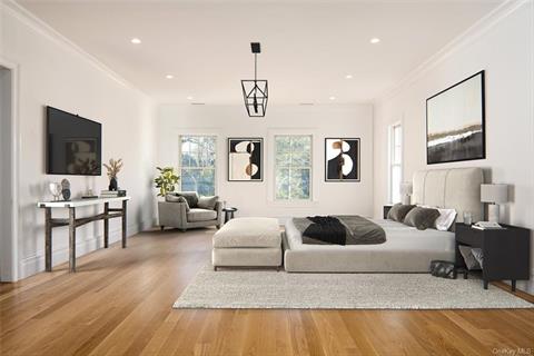 Family room with sliding doors to deck overlooking stunning pool.