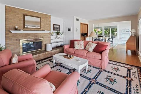 living room with wood fireplace