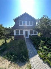 Classic Fire Island Beach House, 2nd from beach is a true gem! Home offers Bikes, Beach Chairs & Beach Umbrella, home is also privy to Seaview amenities. Close to the Village of Ocean Beaches restaurants & Shops as well.