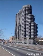 Full-service luxury hi-rise condo. Penthouse duplex. 2 bedrooms, 3 full baths, 1634 sq. ft. 285 sq. ft. terrace with city views, and 132 sq. ft. balcony with lake views. 24 hr. doorman, concierge services, 12, 000 sq. ft. full-service health spa, 60 ft. indoor heated pool, locker rooms w/showers, jacuzzi, steam and sauna rooms,  full workout room, fitness classes, banquet room, walk-in refrigerator for perishable deliveries, and building link. Walk to the subway, LIRR, express busses, supermarkets, dining, and shopping. The current assessment of $857.11 monthly ends 7/2024.