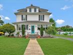 Exquisite Historic Home! The Combined 2 Lot Property is One of a Kind! (.85 Acre Total). Located Less Than 1 Mile From the Heart of Main St. in a Residential Neighborhood Lined with Sidewalks, Making Getting To and From Town Safe and Convenient. Tastefully Painted in Soothing Tones and Compliments the Radiant Glow of the Original Hardwood Floors. The French Doors Allow for Natural Light During The Day And Affords Privacy at Night While Relaxing by the Woodburning Brick Fireplace. The Formal Dining Room is Ideal for Large Gatherings Alongside the Eat-In Kitchen. Modern Amenities Include Central Air Conditioning, Granite Countertops, Gas Stove, Stainless Steel Appliances, Beautiful Bathrooms, Anderson Windows and Recessed Lighting. You will Treasure the Charm of 2 Cedar Closets, 4 Spacious Bedrooms, Appreciate the Size of the Full Basement and be Surprised by the Huge Bonus Room. The Backyard Is the Grand Oasis of This Property! Ample Outdoor Entertaining Space and a Separate Fenced Area for Your Pets. The Gorgeous In-Ground Gunite Pool (20x40) is the Centerpiece of this Backyard, Surrounded by Beautiful Pavers and is Fully Fenced-in For Your Safety. The Out Building (Detached Garage) Situated Near the Pool is Just Waiting for Your Personal Touches! Finally, Imagine the Endless Potential the Adjacent .44 Acre Flat Lot can provide to Transform This Amazing Property into The Home You Have Always Dreamed About!