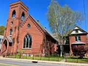 2 neo-gothic style buildings built in 1896. The Rosendale Reformed Church owned the building through 1971, followed by the Volunteer Firemen&rsquo;s Association. Later it became a glass art studio & the parsonage was converted into a two family. In 2012, the 60&rsquo; x 40&rsquo; open space was reconfigured & renovated to allow for events. The soaring ceilings & original fir flooring, a stunning front window, the original corner pulpit, a 1950s curved wet bar make for a splendid setting to come together & celebrate, create, perform, eat, learn, you name it! In There are 3 income-generating apartments.On half an acre adjacent to municipal parking & the Willow Kiln Parl/Joppenbergh Mountain. The Empire State Trail runs through town via the famous Rosendale Trestle. The Event Venue is town approved & is operated as an added revenue source to the art studio & residential rental income. There are many possibilities for this gem on Main Street of this vibrant Hudson Valley Town between New Paltz and Kingston.