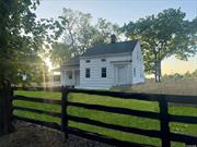 Restored and rejuvenated. This beloved 24 acre North Fork homestead features a charming white farmhouse with 3 bedrooms, 2 bathrooms (to be renovated or can build to suit) on 24 acres with 5 accessory buildings. 4 barns and a 2 car garage. Barn 1 is a 2, 400 Square Foot, 2 Story Barn (50x30), Barn 2 is 20x30 single story built in 2015 and two 400 sqft accessory barns. This farm features two lots, 4.18 acres with 244&rsquo; of main road frontage and 20 acres of DRS agricultural land with 2 irrigation wells. Zoned R-80, the front 4 acres can be subdivided into 2 parcels and there is an approved commercial use of riding academy for the equestrian buyer. Owner is builder and will customize as residential, farm winery with vineyard or equestrian site. Room for pond, pool, tennis, pickleball or sunken riding ring and stables.