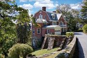 Elegant spacious Georgian-style brick home, designed by renowned architect, William A. Bates for the Herbert C. Pell family in 1892. Located on prestigious Tower Hill Loop, a quiet hilltop setting. All levels of this spacious home offer world class views of Tuxedo Lake and the surrounding hills. The home welcomes you through a center stair hall; the main floor offers grand scale in its living, dining and library, all with fireplaces and south-west exposure for sun all day. The living and dining room both have access to the covered sunset porch. The living room has columns that frame the room, Jefferson windows that open to the porch to bring the outdoors in and beautiful moldings. The dining room features a large picture window that provides an ever-changing view of the lake and panelled wood walls. Off the center hall there is a guest bath and access to a sunny library with built-in bookcases and wood panelled walls. There is a well appointed kitchen with its own entrance and garage. The second floor comprises five bedrooms and adjoining full baths. The third floor is a capacious partially finished area with big windows and lake views. The large open-plan lower level has a family room with a fireplace, a second kitchen, an office, full bath, temperature controlled wine storage and a covered porch with garden access. Private and historic Tuxedo Park is a 24/7 gated police-guarded community within an hour&rsquo;s drive of mid-town Manhattan. The village provides swimming, boating, biking, fishing and hiking as well as cross-country skiing and other outdoor activities at your doorstep.