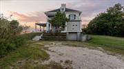 Nature Lovers Paradise! A Haven for Busy Business People and Creatives Alike. Originally designed with spaces that are orientated towards the ocean and sky, the house itself feels like an extension of the natural environment surrounding it. This property is truly unique just shy of 4 acres on the water with your very own private beach. Nestled in the tranquil embrace of Center Moriches, hidden gem along the Idealic shores of Long Island&rsquo;s East End. The Center Moriches location allows you to enjoy the best of both worlds - proximity to New York City, and the allure of the Hamptons - superb restaurants, beaches, parks, and recreational opportunities at your fingertips, this property is a haven for those seeking a diverse and enriching lifestyle. Private community Holiday Beach with Boat slips available. You also have all of the pilings in place for your very own private 60 foot dock. Permits were in place to rebuild the existing dock, and we can assist you to easily get the permit application renewed.  Welcome to a residence where time honored elegance intertwines with the splendor of nature, and every day unfolds as a celebration of life&rsquo;s finest moment. This is more than a Home; it&rsquo;s a sanctuary of luxury, a canvas for creating cherished memories, and a symbol of the extraordinary. A haven made for bringing together family and friends. With West-facing exposure you&rsquo;ll relish the privilege of sunset views that paint the sky, with a captivating tapestry of colors, creating a picturesque backdrop that mirrors the magnificence of the property itself. This sprawling 6200 square-foot house has four private en-suite bedrooms, an additional three guest bedrooms, four full bathrooms and 1/2 bath. Cathedral ceilings, dine in kitchen, home-office, guest quarters, two first floor bedroom suites, second level primary suite and a large second level guest suite. The heart of the home unfolds into an open floor plan layout, seamlessly connecting to the large eat in dining, and kitchen areas. This inviting expanse is a symphony of light and space, with French doors and floor-to-ceiling windows, that frame captivating vistas and infuse the interiors with an abundance of natural light, giving the space a feeling of open, airy grandeur. Just steps away, the gentle ebb and flow of the shore provides a mesmerizing backdrop. Watch the sunrise from your private beach and follow the moon rising over the horizon. As you ascend to the upper level, a sense of splendour envelops you. The primary suite is a haven of opulence, offering sweeping panoramic views that extend to a private deck. The en-suite bathroom, boasts Terrazzo floors, a deep floating tub and a walk-in dressing room, providing an indulgent space for rejuvenation. The journey continues with a guest bedroom off the master suite, and another large guest bedroom found at the far upper level with an en suite bathroom adorned with a claw foot tub and a private deck. The center room between both suites is crowned by a balcony overlooking the living room and breathtaking water views. Beyond the elegant interiors, the outdoor spaces beckon you to embrace the beauty of nature. An oversized gunite heated natural pool, is seamlessly integrated into the expensive deck, which includes a separate jacuzzi for six, inviting you to experience the joys of outdoor living. Just in front of you lies your private beach, and the pristine Moriches Bay, with a large lawn and forest area behind you, bestowing the gift of natural privacy to be cherish. A popular summertime destinations for the residence of Center Moriches is Great Gun Beach located on the fire, Island seashore just off of Smith Point State, Park Preserve. You can go by boat across the intercoastal waterway to enjoy a picnic, walk along the sand dunes, or swim in the Atlantic ocean! There is a magical waterfront restaurant around the block called Silly Lilly&rsquo;s which offers everyone the opportunity to rent a boat and enjoy waterfront dining. This home has it all! Open floor, plan layout, stunning bay views, a private beach, and an inground Gunite pool. This prime location provides easy access to both New York City and the Hamptons so give us a call to schedule your private showing. This property is truly unique and one of a kind. When you drive up the long winding private entrance you instantly feel like you are on vacation. The homeowner also owns an additional parcel of land adjacent to the property available for sale if interested.