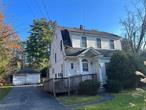 ATTENTION INVESTORS....Welcome to this charming 1930s home, boasting beautiful hardwood floors and an abundance of built-ins. This property offers a unique opportunity for those seeking a fixer-upper with immense potential. With guest quarters on-site and the convenience of a generator hook-up, this home is ready to be transformed into your dream space. Step inside and be greeted by the original hardwood floors, showcasing the character and warmth of this era. The extensive woodwork throughout the house adds a touch of elegance and charm. With some tender loving care, you can restore this home to its former glory. Situated close to town, restaurants, and a vibrant farmers market, you&rsquo;ll have easy access to all the amenities you desire. Just a two-hour drive from the bustling city of New York, this property offers the perfect balance between a peaceful retreat and convenience to NYC. Spanning over 2, 100 square feet, this home provides ample space for your needs. The walk-up attic presents endless possibilities, whether you envision it as an office or an additional bedroom. With 4 bedrooms and 1.5 baths, there is plenty of room for your family and guests. Set on a generous 1.28-acre lot, this property offers both privacy and space for outdoor activities. The original details of the home, including its two-car garage, add to its authentic charm. Don&rsquo;t miss your chance to create the home of your dreams in this 1930s gem. With its prime location, original features, and unlimited potential, this fixer-upper is a rare find. Schedule a viewing today and let your imagination run wild with the possibilities this property has to offer. Additional Information: Amenities:Guest Quarters, HeatingFuel:Oil Above Ground, ParkingFeatures:2 Car Detached,
