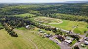 Welcome to Indian Lookout Country Club, a 178-acre outdoor entertainment complex with over 45 years of history. This iconic venue has hosted legendary events like the Harley Rendezvous, concerts, weddings, motocross races, and equestrian competitions. Permitted for gatherings of up to 3, 500 people, it&rsquo;s ideal for large-scale events. The main residence is a 3, 200 sq ft home with 4 bedrooms, 3.5 baths, and an inground pool, while the 1, 800 sq ft guest house includes 3 bedrooms and 2 baths. With electricity, water towers, four 100, 000-gallon mound systems, and sewer access, this property offers endless development potential.