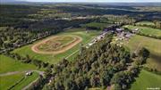 Welcome to Indian Lookout Country Club, a historic 178-acre outdoor entertainment venue with over 45 years of legacy. Renowned for hosting major events like the Harley Rendezvous, concerts, weddings, motocross races, and equestrian competitions, this iconic property is permitted for gatherings of up to 3, 500 people, making it perfect for large-scale events. The main residence is a spacious 3, 200 sq ft home featuring 4 bedrooms, 3.5 baths, and an inground pool, while the guest house offers 1, 800 sq ft with 3 bedrooms and 2 baths. With electricity, water towers, and mound systems already in place, this property is primed for future development.