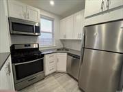 Totally Renovated 2 Bedroom, 1 Full Bath Apartment With Washer/Dryer, Kitchen with quartz countertops. Stainless steel appliances, Full Bath - shower & tub. Recessed lighting, high ceilings, hardwood floors, 2 A/C units, and Free storage.