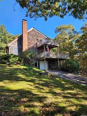 This three-bedroom, two-bath home is situated on a spacious one-acre property on a quiet cul-de-sac. The house features an Eat-in-Kitchen with oak floors, a living room with a wood burning stove, an enormous loft area above the living room, bedrooms with wall to wall carpeting, a full unfinished basement with exterior access and a one-car attached garage for convenient parking. Lovely lovely location and beach rights., Additional information: Separate Hotwater Heater:Y