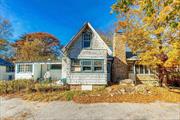 Horton&rsquo;s Point, Southold North Fork: solid acre by beach with existing 1910 house sold in as is condition with caretaker cottage and horse stable. Valuable footprint nestled between Hummel&rsquo;s Pond and Horton&rsquo;s Point offers an upscale and private setting with access to neighboring Horton&rsquo;s Point Lighthouse and Long Island Sound Beach. An ideal redevelopment opportunity - or - renovate to taste, this characterful, once &rsquo;storybook&rsquo; cottage home just minutes to Southold village, Long Island Railroad, area vineyards and farmstands.  House & property needs substantial work - but what a stellar location. Cross marketed as LAND at same price. Location, Location, Location!