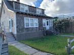 This Home is Available To Rent Weekly For $2, 500 with a two week minimum, NOT a month. Fire Island is a vacation destination. Step into the warm embrace of this charming two-family residence! The entire first floor is yours to enjoy during your stay. Our property features an outdoor shower for a refreshing post-beach rinse, Separate entrances to ensure your privacy, provided beach chairs and a beach umbrella, so you can relax in style, and handy wagon to transport your beach essentials with ease.