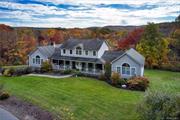 This custom built home was designed to let the outdoors in with over 60 oversized Pella windows throughout the home. Located on a quiet street minutes to the Village of Sloatsburg. Enjoy a gourmet kitchen with open concept layout, granite counters, marble backsplash, a full wall of pantry space,  electrical outlets inside the cabinets, brand new 6-burner Viking Range, and other high end appliances. A fabulous sun room and oversized great room are large ad bright and welcoming, they are connected by a two-sided stone fireplace. The dining room has 23&rsquo; ceilings and access to an incredible 70&rsquo; deck that spans the length of the house overlooking a peaceful sanctuary of woodlands that is spectacular to birdwatch. The first floor master suite has a large sitting room with a private deck, 15&rsquo; vaulted ceilings, and a luxurious 5-piece spa bathroom with two large walk in closets. Upstairs are three bedrooms and a full bath. The lower level spans the full length of the house and offers tall ceilings and walk-out access to the backyard, and access to 3-car oversized garages. Perennial gardens and a stone stairway lead to the house. House has 200A electric, central vacuum, Radiant heat floors on all tile and hardwood floors, landscape irrigation, recessed lighting, 2019 HW Heater, and more. 34 miles to NYC, 1.1 miles to the Train and Bus. Surrounded by nature, hiking trails and lakes at Harriman State Park, Sterling Forest State Park, Ringwood State Park.. and more.