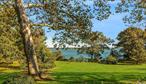 2025 Rates: June 15 â€“ Sept 1: $55K; June: $12, 500; July: $20, 000; A1â€“LD: $22, 500; Sept 1â€“30: $7, 500; October: $7, 500: Pristine Mid Century Modern Waterfront with 200&rsquo; Of Private Sugar Sand Beach on sprawling 2 acre parcel! Property Features Breathtaking Views Of Robins Island, Southampton And Nassau Point. Chic Furnishings Adorn This Lovely Home Along with Interior Panoramic Views Of The Great Peconic Bay. Open Living Space with High Ceilings, Primary Master Suite, 3 Additional Bedrooms, An Eat-In Kitchen And an additional 2.5 Baths. If you&rsquo;re looking for privacy, ideal water access and one of the best location the North Fork has to offer, this is not to be missed!