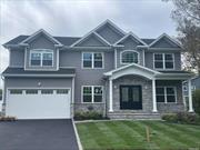 Construction Almost Complete - Hamptons Colonial 5 Bedrooms 4.5 Bath. 2 Master bedroom suites! One spacious Master suite on 1st floor and another Oversized Master Suite on the 2nd floor makes this home perfect for extended family...Bright, open floor plan is perfect for entertaining!