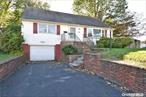 Beautiful Sunny 1 Family Home..Updated Kitchen, Bathroom, 3 Bedrooms, LR/DR. House is Spacious with LR/Kitchen, Hardwood Floors, Updated Windows, Fully Fenced Private Backyard. Full finished Basement. Close to Highways, Shopping.  New Roof. Very close Walt Whitman Mall and Melville road. MOTIVATED SELLER.