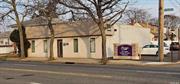 Free Standing building on busy road currently being used as a medical office. Can also be for other professional office types. Reception area, waiting room, 8 rooms (offices, exam rooms, kitchen), 2 bathrooms, front entrance and rear door. Private Newly Redone parking lot with Approx 11 spaces. HVAC. 1.5 miles from LIRR.