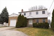 4 bedroom, 2.5 bath colonial with den, finished basement, office, new roof, new flooring, new boiler and HW heater.