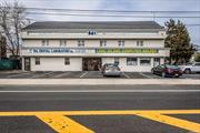 This commercial property is a standalone building located at a bustling intersection on SunriseHighway in West Babylon. It features three floors, each approximately 2, 000 square feet. The ground level is divided into two distinct sections: a dental lab and a retail showroom/service space, currently vacant. The second floor is cleverly partitioned into two independent areas, each with its own entrance.One area, previously used by an insurance company, includes a lobby, a half-bathroom, and three offices. The other area boasts an open office space, a kitchen, two half-bathrooms, three separate offices, and a data room. The third floor houses a cozy apartment with one bedroom and one full bathroom, along with extra space for storage and potential expansion. This property offers a blend of commercial and residential opportunities, making it suitable for various business ventures in a high-traffic area.