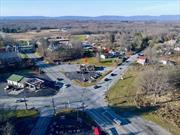 MIDDLETOWN/TOWN OF CRAWFORD...MANY POSSIBILITIES FOR DEVELOPMENT FOR THIS SUPER HIGH TRAFFIC WITH APPROXIMATELY 5000 CARS/DAY & HIGH VALUE LOCATION ON 5 CORNERS ON 2.14 ACRES WITH 200&rsquo; ROAD FRONT ACCESS FROM EACH ROAD...One side is State Route 17K and on the other side State Route 302. Sale includes 2 separate properties selling only together. One w/commercial successfully active on one level, fully equipped 80 seat restaurant building for the last 34 years open 7 days a week w/access from both roads & currently rented. On the other parcel is a single family home currently rented. Both properties have separate septic & common well for water. Restaurant has propane for heating fuel. House has oil for heating fuel. Buyer can be a restaurant operator or a developer w/possible (gas station w/convenience store, liquor store, Dunkin&rsquo; Donuts w/drive-thru, car sales...etc.) plans to maximize the value of this super busy location in Orange County next to a gas station/convenience store...Easy access location w/ short drive to Middletown, I-84, Montgomery, Newburgh & Pine Bush and connecting Orange, Ulster and Sullivan counties...