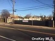 Vacant Land. Fenced Use for Parking or Storage. 10, 000 SQFT.  50 Feet of Road Front X 200 Feet Deep. Flat Surface w/Crushed RCA. Excellent for Parking or Storage. Fenced. Central Location, 6 miles to JFK, Minutes to Sunrise Highway. Note: If Needed Additional 1, 000sqft warehouse available for lease. (18ft ceiling w/ roll up door).