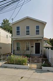 Welcome to Ozone Park, where this inviting detached 2-family residence awaits its new owners. Boasting a total of 4 bedrooms and 3 full bathrooms, this charming home is complemented by an unfinished basement, a shared driveway, and a fenced yard for added privacy. The property is thoughtfully divided into two separate apartments, each with its own entrance. Both apartments feature 2 bedrooms, a spacious living room, an eat-in kitchen adorned with granite countertops, and a full bath. A major renovation in August 2018 introduced new electrical wiring, plumbing, roof, windows, siding, central heating and cooling, and interior enhancements, ensuring modern comfort and functionality throughout. Investors will appreciate the individual gas and electric meters for each apartment, adding a practical element to this property. Currently, the first floor is leased at $2, 400 per month, inclusive of 2 parking spots in the yard. There is potential to add value by finishing the basement and renting it along with the first floor unit. The tenant is open to vacating the premises upon the successful completion of the sale. The second floor, although currently unoccupied, was previously leased for $2, 050 without parking spots/yard access. Conveniently situated within blocks from the A train and various bus routes including Q11, Q21, Q41, Q52, Q53, Q7, Q8, and QM15, this residence offers accessibility to public transportation, further enhancing its desirability. Don&rsquo;t miss the opportunity to own this well-appointed and income-generating property in the heart of Ozone Park.