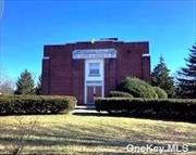 Survey says, 8, 000 Sq. Ft. 2 Story Brick Building. 4, 000 Sq Ft Basement with Full Operating Kitchen Featuring a Garland Stove and an Ansul Kitchen System with a 3 Tub Sink and Fellowship Hall. Upstairs is 4, 000 Sq. Ft. with 2 Full Bathrooms. This Nicely Maintained Brick Building is Set on 1.49 Acre, Corner Lot. Ample Parking in Rear.  Roof is 7-10 Yrs.Young, Updated Electric. Seller Wants Garland Stove & Ansul Kitchen and Chairlifts If not Being Used in Sale. Taxes May Change, Depend on Use.