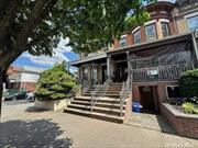 Welcome to this spacious &rsquo;brownstone style&rsquo; home in the heart of Jamaica Queens, convenient to everything! The first floor greets you with a cozy porch. Enter into open concept, tall ceilings, large windows, allowing vibrant natural light to flow through this home. The spacious living room connects to the formal dining room and generous sized eat in kitchen with powder room, and back door to the patio, paved and fenced backyard. The upper level continues with the primary bedroom with large windows, tray ceilings and charm! Three additional bedrooms (one is used as a den/ walk in closet), full bath with sky light. The home is efficient and complete with gas heat, gas cook and four piece ductless air/heat units (one compressor). The lower level is a legal one bedroom apartment (bath and kitchen) with two entrances and at the street level. Nestled conveniently to everything, including Jamaica Hospital, the Van Wyck Expressway with quick access to JFK, a swift walk to the MTA trains (trains E, J, Z) and Q8 bus just across the street. This home has all the comforts and convenient location you want and need for your busy lifestyle. Don&rsquo;t miss this one, call today for private appointments.