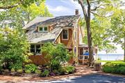 This lovingly restored 1902 shingle-style beach house on the Peconic Bay is a great place to relax, and enjoy the beauty of the North Fork. Step back into an era of gracious living, with all the amenities of modern life. Boasting incredible southern views, bay breezes, and generous proportions, this beautiful home is sure to exceed your expectations. The four bedrooms in the main house, two with balconies overlooking the Bay, provide plenty of space for your family and guests. And if you need a little extra room, the separate cottage is sure to come in handy. Some of the original features include high ceilings, tall windows, and hardwood flooring. The sunny, updated kitchen has a large center island, leading to a generous formal dining space. Open to the generous living room with wood-burning fireplace, your gaze is drawn towards the water views and the fully enclosed sun porch for lounging, dining and entertaining. A den/study on the first floor is complete with built-in bookcases and cabinetry, and the first floor bath has both a claw-footed tub and walk-in shower. With 106&rsquo; of waterfront, the double bulkheading allows for a private beach area and (bonus!) winch to help you get your water toys in and out of the bay. This charming historic retreat is close to shopping, farmstands, and vineyards. Breathe deep and relax.