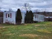 Affordable Fixer-Upper: 3BR, 1BA Mobile Home Project !Are you a handyman or investor looking for a renovation project? Look no further! This mobile home is nestled on a spacious 1.7-acre lot, offering a serene escape with direct access to the picturesque Neversink River, ideal for fishing, kayaking, or simply enjoying the peaceful surroundings.The property features a fenced yard, providing both privacy and security for your family and pets. Don&rsquo;t miss the opportunity to make this mobile home yours! Contact us today to schedule a viewing and experience the beauty of Neversink River living.