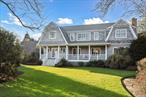 Halfway down Rogers Lane, this beautiful Nantucket shingle style home beckons you in. With its spectacular curb appeal and elegant winding path amidst specimen plantings, you are led to a welcoming front porch. This timeless home, south of South Country road and a block from the Bay, abounds with charm. Once inside, its two story, light-filled foyer conveys a sense of warmth and invitation with its open floorplan, impressive finishes, custom trim details, and the ability to see from one room to another. The Living Room, Dining Room, Kitchen, Sitting Room and Den, all large rooms, flow into one another with sophistication and ease allowing the home to function for all. The &rsquo;kitchen is the new living room&rsquo; with multiple work areas, custom cabinetry, top of the line appliances opening to Breakfast Area, Sitting Room, Living Room, Den, sliders to deck and pool, hot tub, sweeping lawn, and with its fun playset! Five Bedrooms and Five Bathrooms, 4 fireplaces, two laundry areas and a massive basement w 10&rsquo; ceilings.... And finally, not to miss, this home&rsquo;s evening portrait, with its artfully designed landscape lighting is magical, like jewels on the gown.