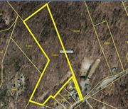 AWESOME LOCATION with EXCEPTIONAL VIEWS!!! Build an amazing, secluded Dream Home on this unique property!!! This 12.86 acre property has had the majority of the driveway cut in following Town of Wappinger specs. The building site is anywhere on the property, however, the highest point has a view of 3 counties. It has almost a 360 degree view with the exception of a sliver to the Northwest. This property boasts the highest point in Wappingers at 525 feet. Owner has aerial maps, survey with all 11 corners pinned. and recent permit closure for driveway excavation per required town grades. Owner intended to build but recent job changes and scheduled relocation puts this property on the market. This is definitely one you will want to see. The view is phenomenal. While there is easy access to Route 52 and Route 9 businesses, I84, Beacon Metro North, the location is peaceful and serene., IMPROVMNTS:Rough Graded, Wooded Acres:10.00