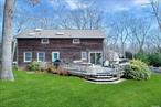 Experience refined living in the exquisite 3 bedroom 3 bath home available to rent for the summer season. This charming residence is in the heart of Southold where beach and town access is most convenient. Delight in the spacious grounds surrounding this property tucked up on a meandering hill providing a serene, private retreat. The backyard is fenced and pets are welcome. Step inside to discover a modern chic interior, perfectly curated for comfort and style. The spacious grand primary en-suite bedroom is complete with a new spa-appointed bathroom, vaulted ceilings, and walls of windows. There is also another en-suite bedroom equally appointed with great light and plenty of closet space. The third bedroom is on the main level with easy access to the living quarters. The home is complete with a beautiful kitchen that leads out to a large deck for entertaining, a comfortable and spacious living space, and a formal dining room. The lower level has laundry and a small recreation space. Goose Creek Beach is within a mile. Come enjoy the East End!, Additional information: Lease Term:August-Labor Day, Flexible, June, Monthly, Off Season, Weekly Renta Amt:4500