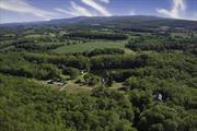 The options are endless for this very special 120-acre property on a spectacular country road in beautiful Ancramdale, NY. The property, which has been a family compound for multiple generations, begins with a very long private driveway that leads to the original 1850&rsquo;s farmhouse and guest cottage overlooking a gorgeous 4+ acre pond. As you continue down the driveway, past lovely rolling hills, an old swimming pool & tennis court, a summer cottage and a couple of other outbuildings, the property goes up a hill to two additional residences built in 1970 and 2000, with stunning views of the mountains and exquisite surrounding farmland. This fabulous property is waiting for new owners to make a new family compound. With the exception of the house built in 2000, the others all need to be torn down or completely re-built (all the infrastructure is in place such as driveway, electric, septics, wells), so it is a question of building, but not putting in infrastructure. Conveniently located to all that the Hudson Valley has to offer, less than 10 minutes to Millerton and Pine Plains, less than 30 minutes to Rhinebeck, Hudson and Millbrook and just 2 hours to Manhattan. Bring your imagination, wonderful properties that offer this level of privacy and views extremely rare., Other School:DUTCHESS DAY, OTHERROOMS:Office/Computer Room, Library/Study, Great Room, Laundry/Util. Room, Rec/Play Room, Family Room, InteriorFeatures:Electric Dryer Connection, Walk-In Closets, Sliding Glass Doors, Gas Stove Connection, Basement:Interior Access, Garage Access, FLOORING:Wood, Ceramic Tile, AboveGrade:4144, ROOF:Metal, EQUIPMENT:Carbon Monoxide Detector, Smoke Detectors, Cooling:Ceiling Fan, Below Grnd Sq Feet:300, FOUNDATION:Concrete